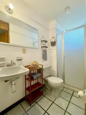 Un baño de Acogedor departamento cerca de la playa