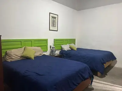 Cama o camas de una habitación en La Casita de Carranza