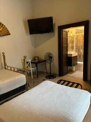 Cama o camas de una habitación en Hotel Boutique Casona los Pavorreales