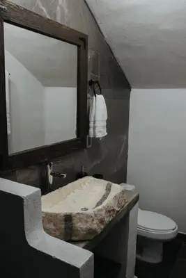 Un baño de Departamentos Madero
