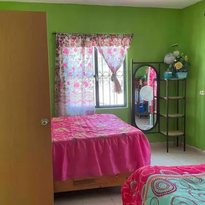 Cama o camas de una habitación en Casa Bonita Con Palapa
