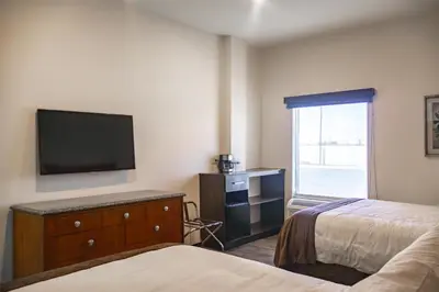 Cama o camas de una habitación en Best Western Plus Chihuahua Sacramento