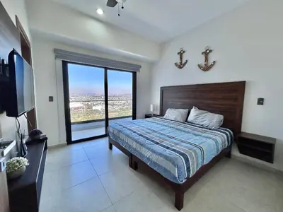 Cama o camas de una habitación en Altomare hermoso depa con vista al mar