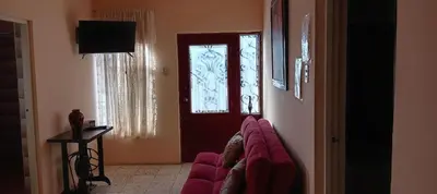 Una televisión o centro de entretenimiento en Departamento J y L