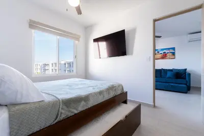 Cama o camas de una habitación en ideal para relajarte cerca de playa by G P S rentas