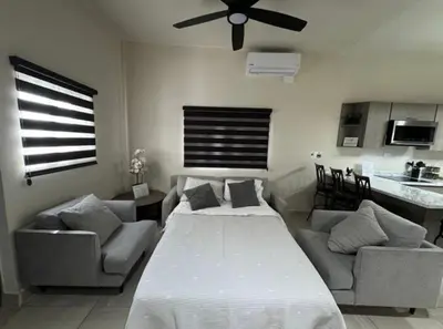 Cama o camas de una habitación en Departamento cerca del Consulado