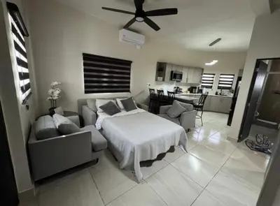 Cama o camas de una habitación en Departamento cerca del Consulado
