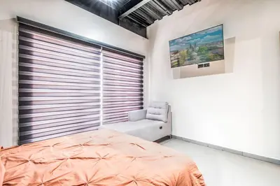 Cama o camas de una habitación en Dpto Industrial y Ejecutivo en Excelente Ubicacion