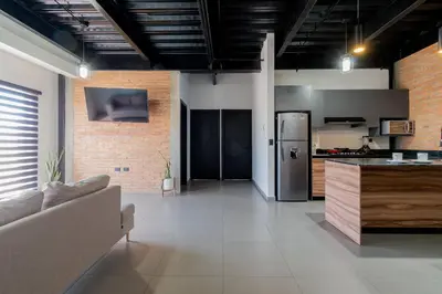 Una cocina o zona de cocina en Depa Industrial Lujoso