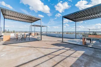 Un balcón o terraza de Depa Industrial Lujoso