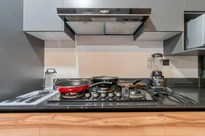 Una cocina o zona de cocina en Depa Industrial Lujoso
