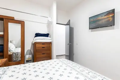 Cama o camas de una habitación en Condo en el Corazón del Turismo muy Cerca de la Playa