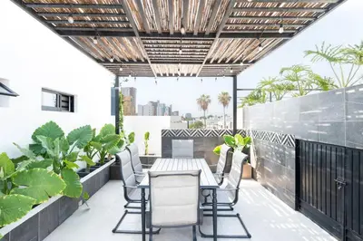 Zona de estar de Condo en el Corazón del Turismo muy Cerca de la Playa