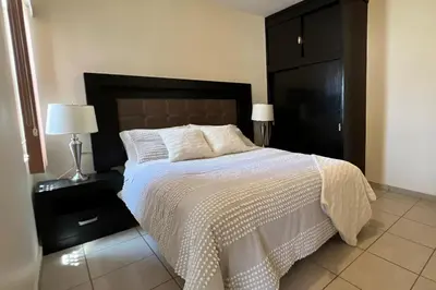 Cama o camas de una habitación en Depa cerca Del Consulado 3