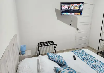 Cama o camas de una habitación en MAZA HOUSE, Cerca de la playa, privada con alberca