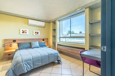 Cama o camas de una habitación en Hermoso Depa en Centro Historico con Mini split