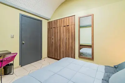 Cama o camas de una habitación en Hermoso Depa en Centro Historico con Mini split