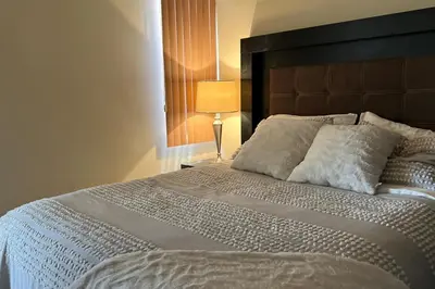 Cama o camas de una habitación en Depa en Centenario Exelente Ubicación 1!