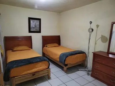 Cama o camas de una habitación en Confortable vivienda entera La Casa Amarilla