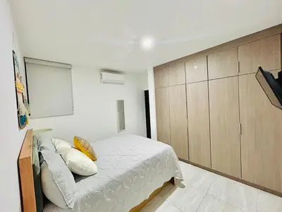 Cama o camas de una habitación en moderno con alberca cerca de la playa by G P S rentas