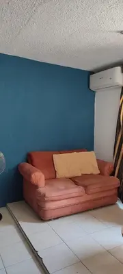 Cama o camas de una habitación en Casa completa a minutos de la playa en auto