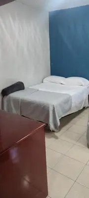 Cama o camas de una habitación en Casa completa a minutos de la playa en auto