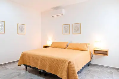 Cama o camas de una habitación en Hermoso Depa Ejecutivo en el Corazon de Mazatlán