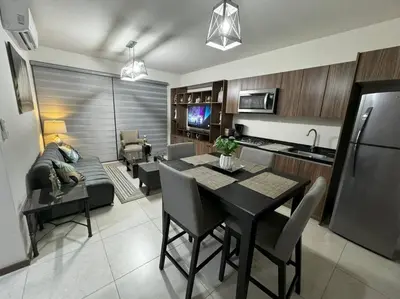 Una cocina o zona de cocina en Departamento Nuevo Frente al TSM