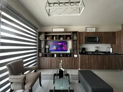 Una cocina o zona de cocina en Departamento Nuevo Frente al TSM