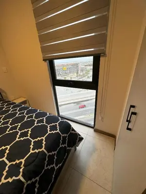 Cama o camas de una habitación en Departamento Nuevo Frente al TSM