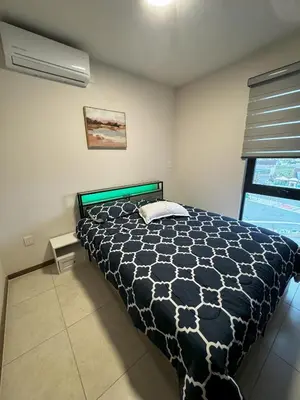 Cama o camas de una habitación en Departamento Nuevo Frente al TSM