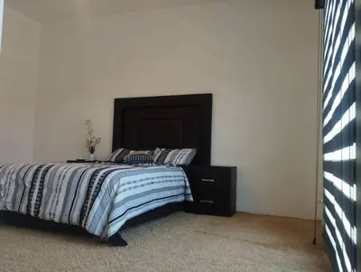 Cama o camas de una habitación en Hermosa casa a 5 minutos del consulado Americano, cuenta con 3 recamaras, sistema de refrigeración y calefacción