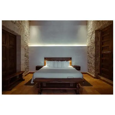 Cama o camas de una habitación en La Gloria Mesón