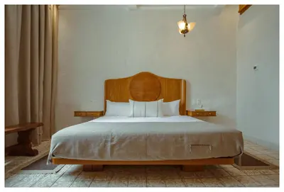 Cama o camas de una habitación en La Gloria Mesón