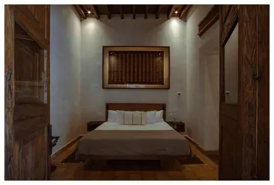 Cama o camas de una habitación en La Gloria Mesón