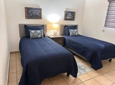Cama o camas de una habitación en Comodo y ubicado Departamento Visa hospitales USA