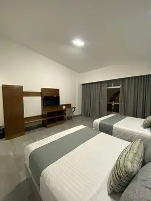 Cama o camas de una habitación en Solamar Inn Mazatlan
