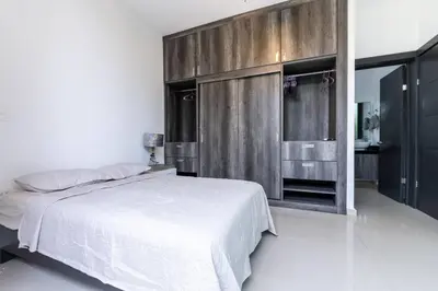Cama o camas de una habitación en depa moderno y en zona dorada súper centrico