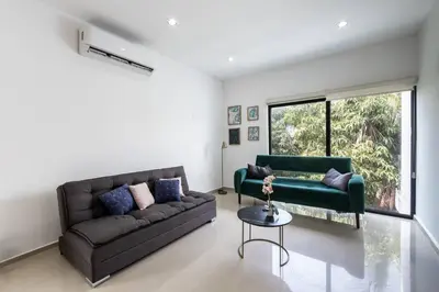 Zona de estar de depa moderno y en zona dorada súper centrico