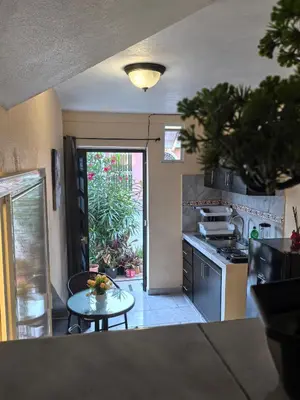 Una cocina o zona de cocina en Habitación principal en Mazatlán