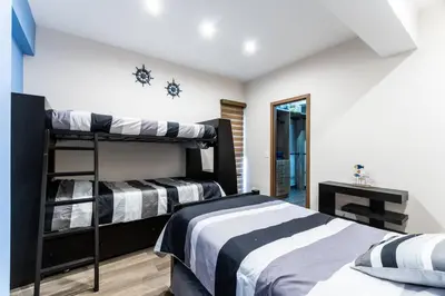 Cama o camas de una habitación en Departamento frente al mar cerca de Mazagua