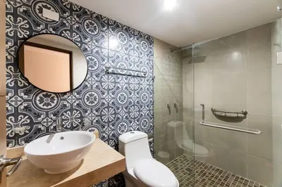 Un baño de Departamento frente al mar cerca de Mazagua