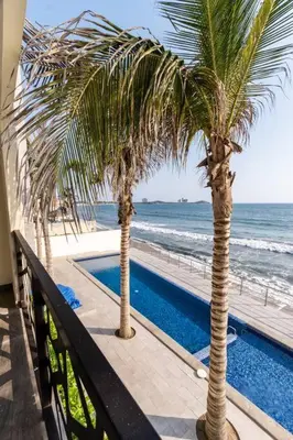 Piscina en o cerca de Departamento frente al mar cerca de Mazagua