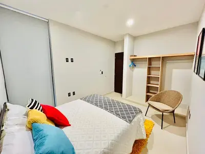 Cama o camas de una habitación en Departamento cerca del malecón y estadio venados