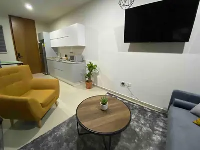 Una cocina o zona de cocina en Impecable loft, terraza, alberca, cerca de playa