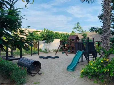 Zona de juegos infantil en Casa esmeralda grand