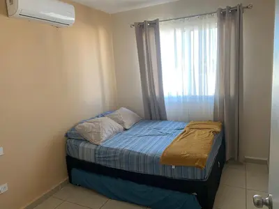 Cama o camas de una habitación en Depa playa esmeralda