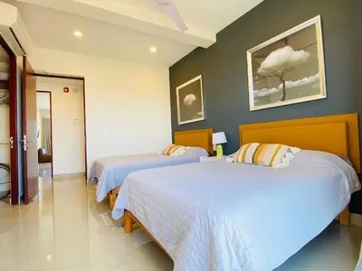 Cama o camas de una habitación en Gavias Grand Cerritos