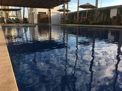 Plano de Moderno Condominio alberca a 800 metros de playa