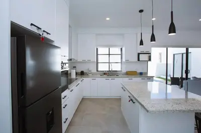 Una cocina o zona de cocina en Exclusive pool house